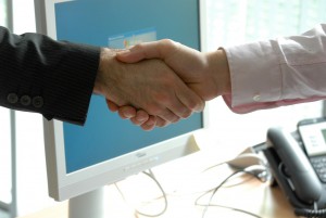 networking-holiday-party-handshake